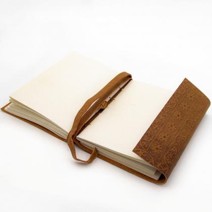 Old-fashioned Cursive Embossed Leather-bound..